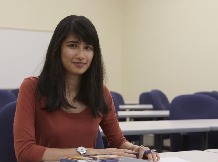 Young student in business class. 